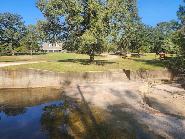 view of yard with a water view