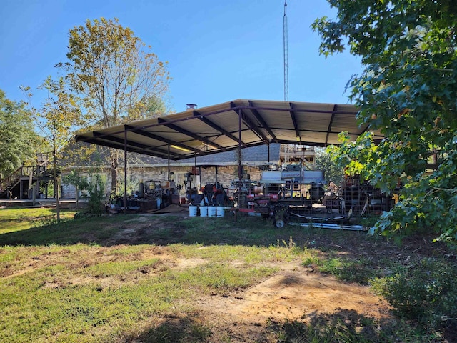 view of yard featuring a carport