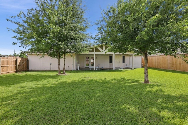 652 Birchwood Dr, Port Neches, TX 77651 - back of property featuring a fenced backyard