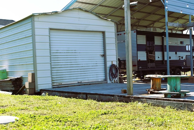 view of outdoor structure with an outdoor structure and a detached carport