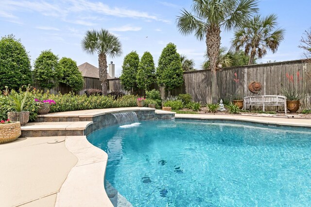 2425 Amberwood Dr, Beaumont, TX 77713 - view of swimming pool featuring a patio, a fenced in pool, and a fenced backyard