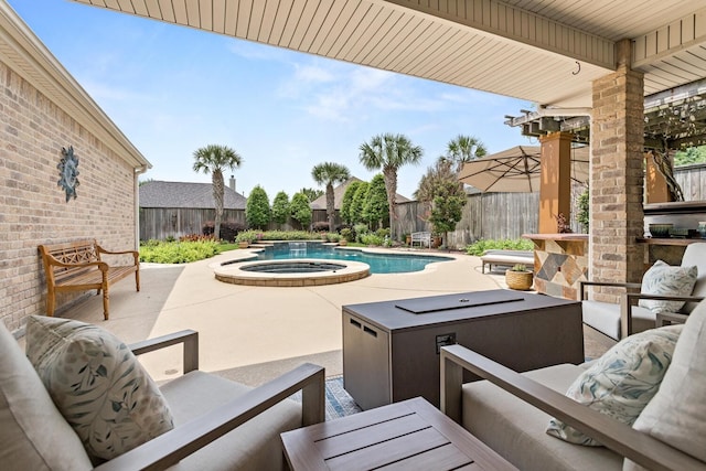 2425 Amberwood Dr, Beaumont, TX 77713 - view of swimming pool with a fenced backyard, a patio, a pool with connected hot tub, and outdoor lounge area