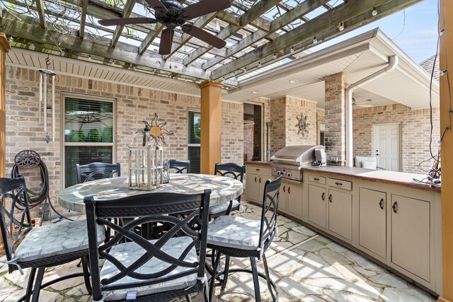 2425 Amberwood Dr, Beaumont, TX 77713 - view of patio with grilling area, a ceiling fan, outdoor dining area, an outdoor kitchen, and a pergola