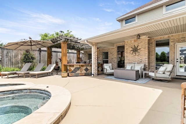 2425 Amberwood Dr, Beaumont, TX 77713 - view of patio / terrace featuring outdoor lounge area, an in ground hot tub, fence, and a pergola