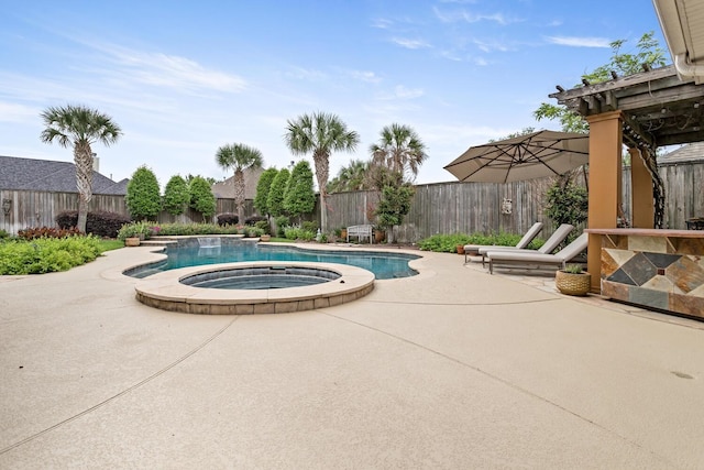 2425 Amberwood Dr, Beaumont, TX 77713 - view of swimming pool with a patio, an in ground hot tub, a fenced in pool, and a fenced backyard