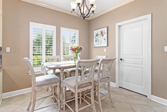 2425 Amberwood Dr, Beaumont, TX 77713 - dining area featuring an inviting chandelier, ornamental molding, baseboards, and light tile patterned flooring