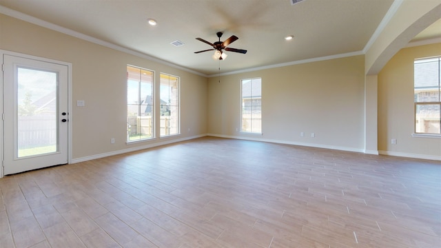 175 Sycamore Ct, Lumberton, TX 77657 - empty room with arched walkways, ceiling fan, light wood-type flooring, ornamental molding, and recessed lighting