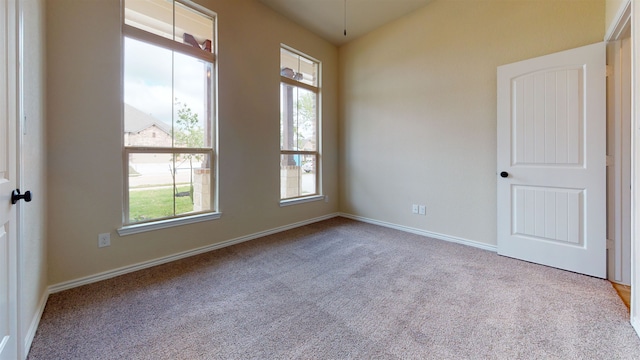 175 Sycamore Ct, Lumberton, TX 77657 - empty room featuring healthy amount of natural light and carpet