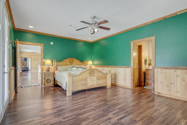 bedroom featuring ceiling fan, dark wood-type flooring, and ornamental molding