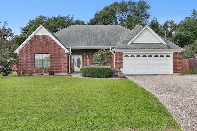 view of front facade featuring a garage and a front lawn