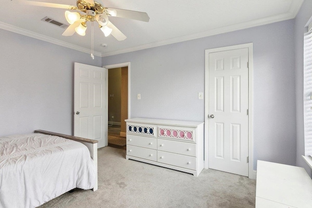 carpeted bedroom with multiple windows, ceiling fan, and ornamental molding