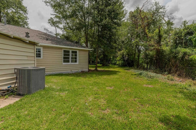 view of yard featuring central AC