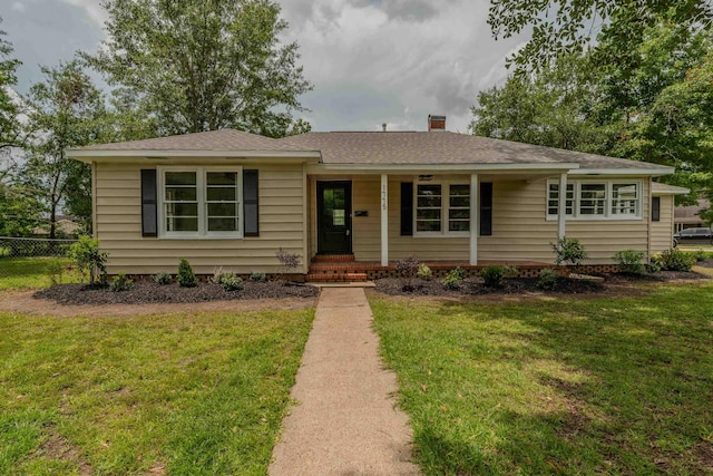 ranch-style home with a front yard