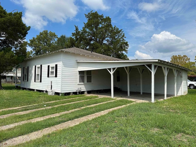 410 N 6th St, Silsbee, TX 77656 - view of side of property featuring a yard