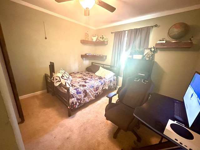 carpeted bedroom with ceiling fan and crown molding