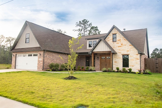 245 Balsam Bnd, Lumberton, TX 77657 - view of front of property with a garage, board and batten siding, driveway, and brick siding