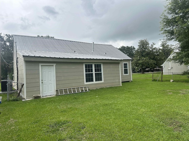 127 Hilldale Dr, Nederland, TX 77627 - back of property with metal roof and central AC unit