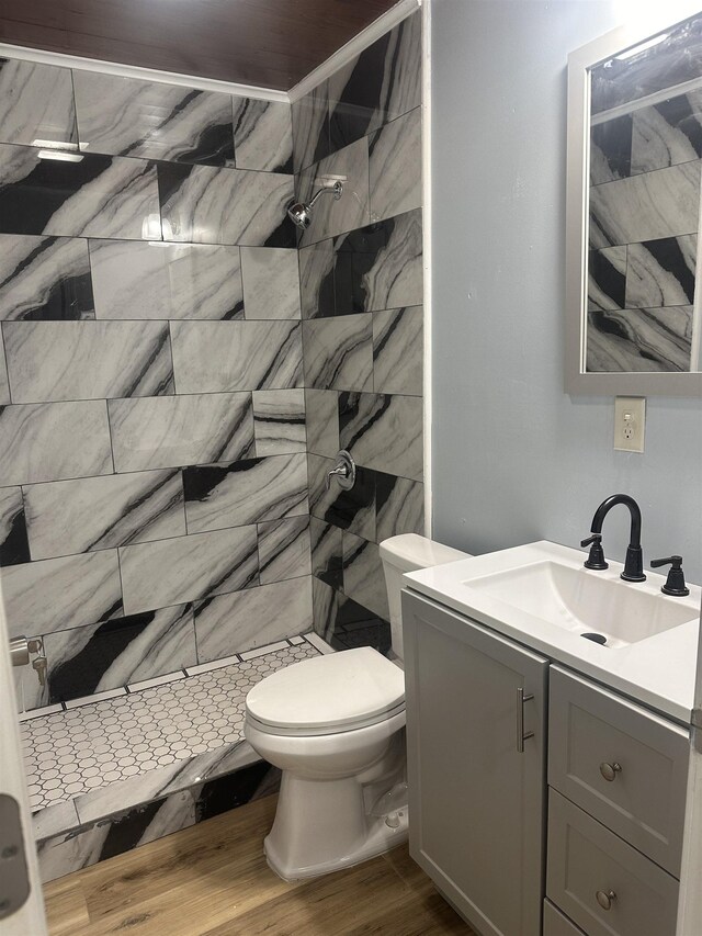 127 Hilldale Dr, Nederland, TX 77627 - full bathroom with vanity, a shower stall, toilet, and wood finished floors
