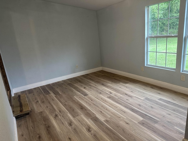 127 Hilldale Dr, Nederland, TX 77627 - empty room with baseboards and wood finished floors