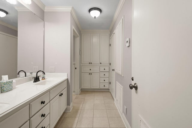 1911 Huntsman St, Orange, TX 77632 - full bath with double vanity, baseboards, tile patterned floors, and crown molding