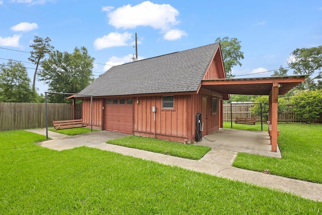1911 Huntsman St, Orange, TX 77632 - view of outdoor structure featuring driveway