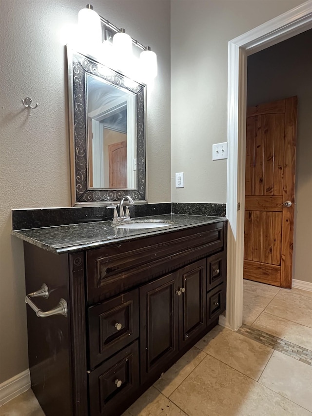 bathroom with vanity and tile patterned floors