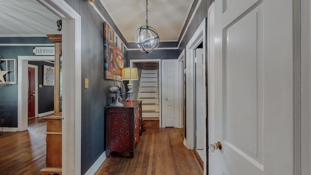 2635 Gladys Ave, Beaumont, TX 77701 - corridor with hardwood / wood-style floors, baseboards, an inviting chandelier, and crown molding