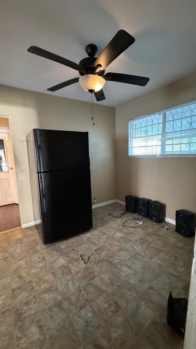 kitchen with black refrigerator