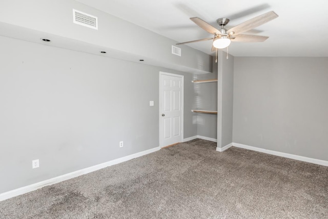 spare room with ceiling fan and carpet floors