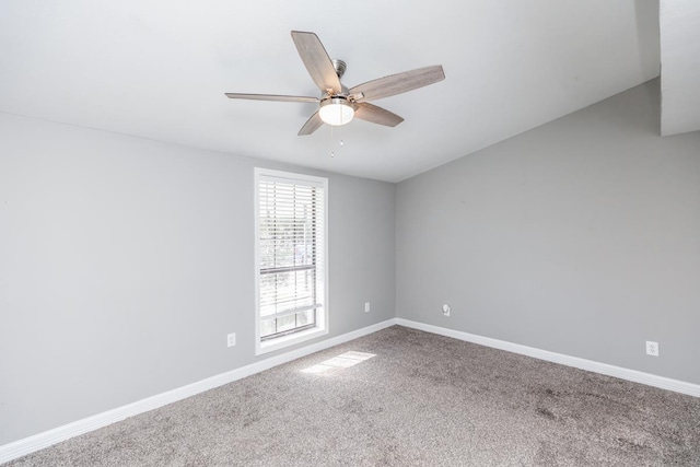 empty room with carpet flooring and ceiling fan