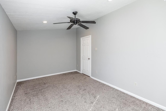 spare room with carpet flooring and ceiling fan