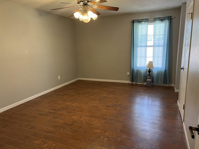 unfurnished room with a textured ceiling, ceiling fan, and dark hardwood / wood-style floors