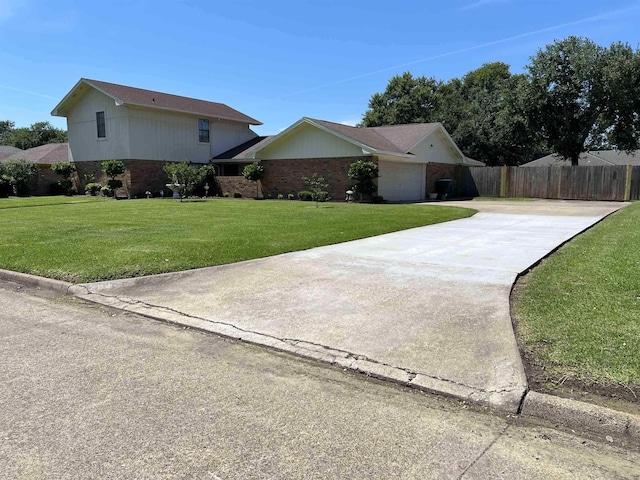 view of home's exterior with a lawn and a garage