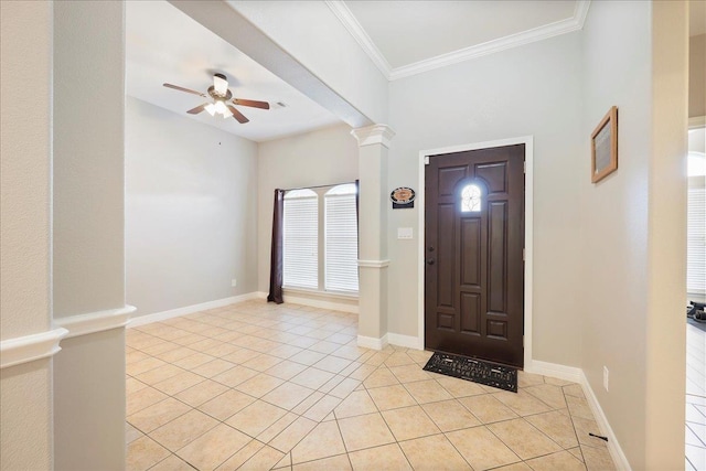 7820 N Windemere Dr, Beaumont, TX 77713 - foyer entrance featuring light tile patterned floors, a ceiling fan, decorative columns, ornamental molding, and baseboards