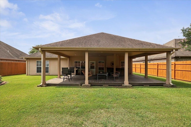 7820 N Windemere Dr, Beaumont, TX 77713 - rear view of house with a wooden deck and roof with shingles