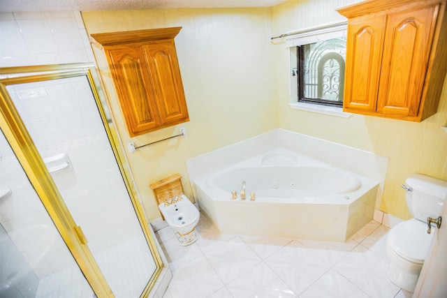 bathroom with tile patterned floors, toilet, and shower with separate bathtub