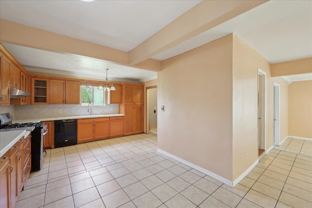 1035 Chamberlin Dr, Beaumont, TX 77707 - kitchen with under cabinet range hood, backsplash, light countertops, dishwasher, and stainless steel gas range oven