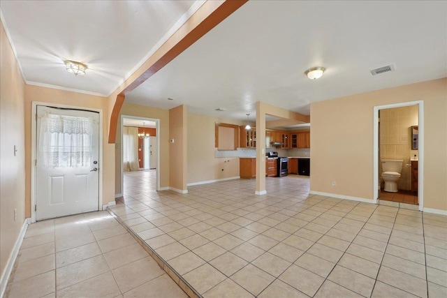 1035 Chamberlin Dr, Beaumont, TX 77707 - foyer entrance with light tile patterned flooring, visible vents, ornamental molding, and baseboards