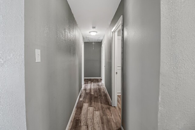 hall featuring dark wood-type flooring