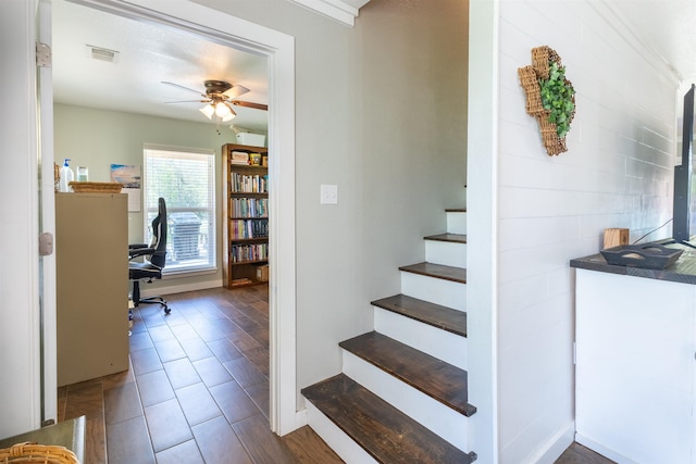 310 Medford Ln, Vidor, TX 77662 - stairs with ceiling fan and visible vents