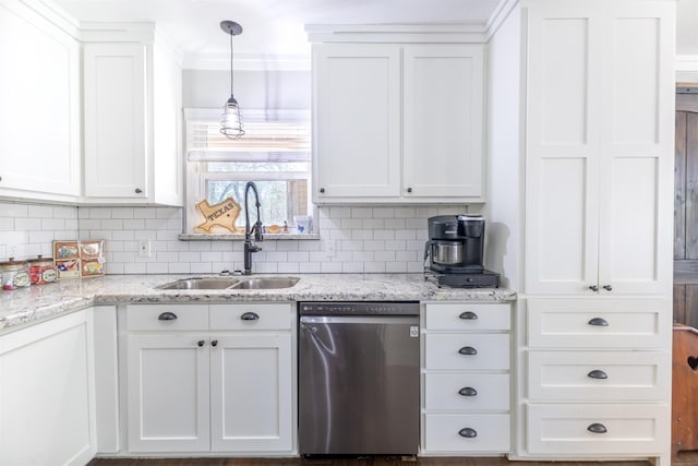 310 Medford Ln, Vidor, TX 77662 - kitchen featuring tasteful backsplash, white cabinetry, a sink, decorative light fixtures, and stainless steel dishwasher