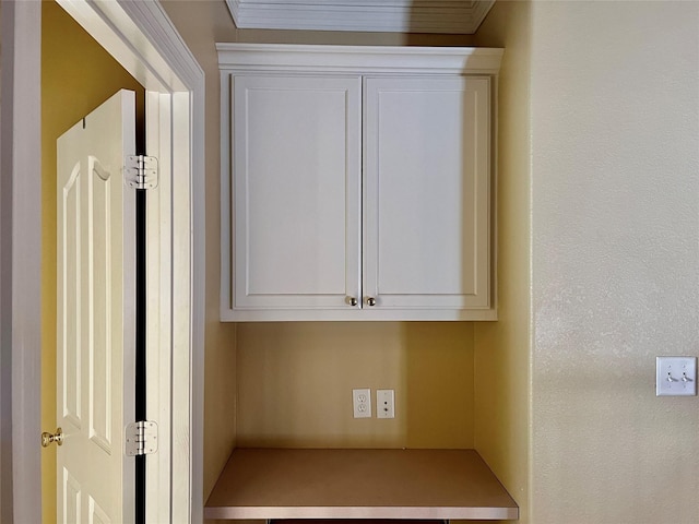 interior space featuring ornamental molding