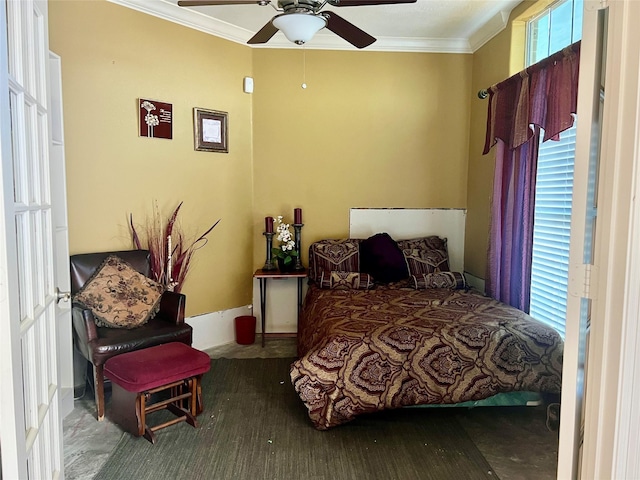 bedroom with hardwood / wood-style flooring, ceiling fan, and crown molding