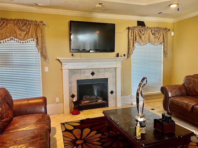 tiled living room featuring ornamental molding and a tile fireplace