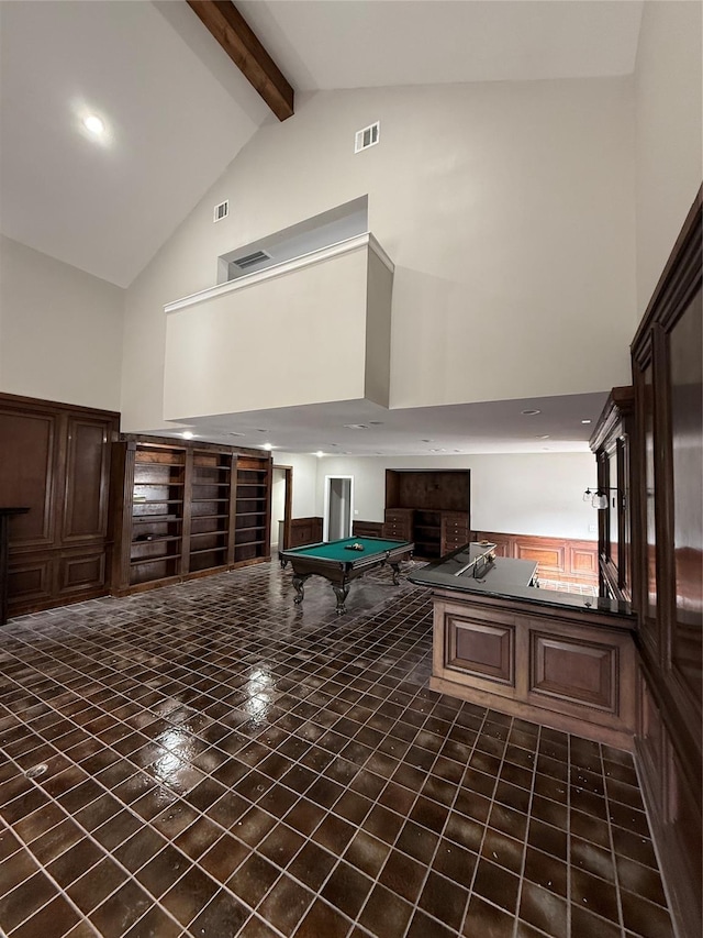 recreation room with pool table, dark tile patterned flooring, beam ceiling, and high vaulted ceiling