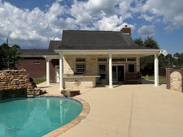 view of pool featuring a patio area