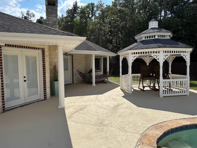 view of patio / terrace featuring a gazebo and french doors