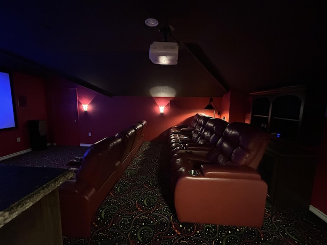 cinema featuring lofted ceiling