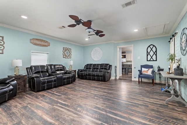 living room with ceiling fan, ornamental molding, and dark hardwood / wood-style flooring