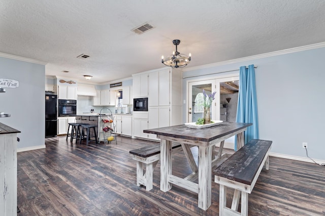 dining room with dark wood-type flooring and ornamental molding